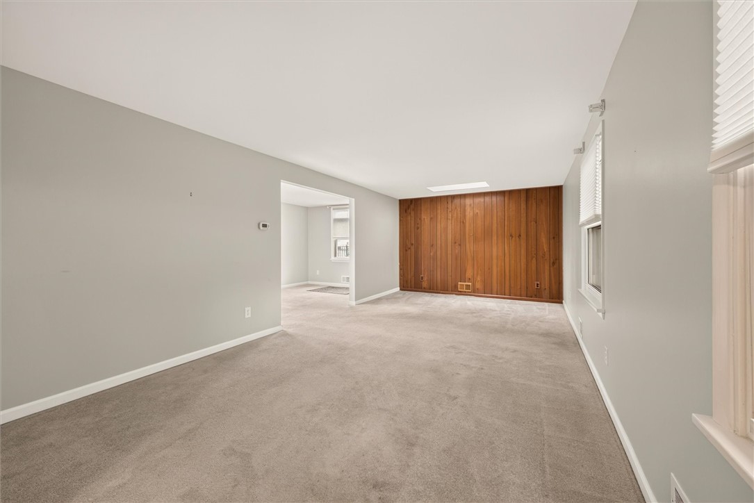 25 Whippletree Road Perinton, NY 14450 - Photo 12 of 44 Large living room with loads of natural light