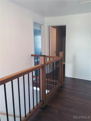 a view of a porch with wooden floor