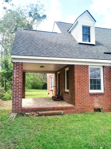 a house view with a garden space