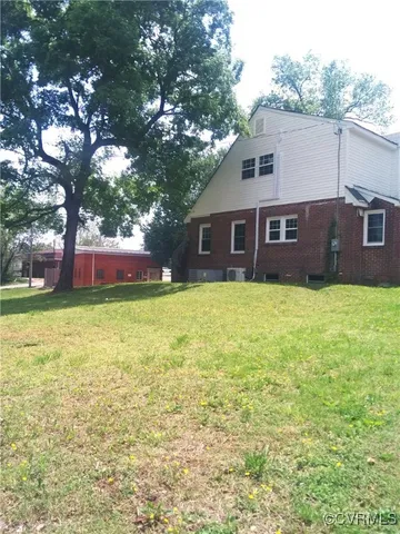 a house view with a outdoor space