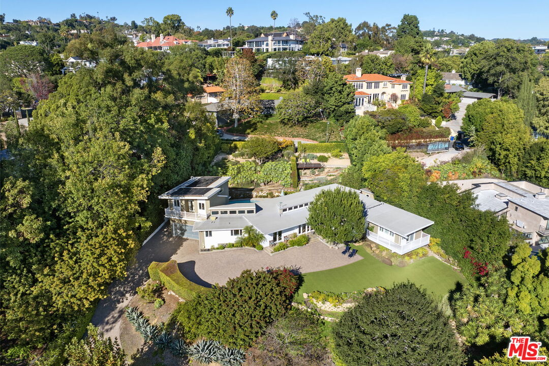 11215 Sunset Boulevard Los Angeles, CA 90049 - Photo 11 of 74 an aerial view of residential houses with outdoor space and street view