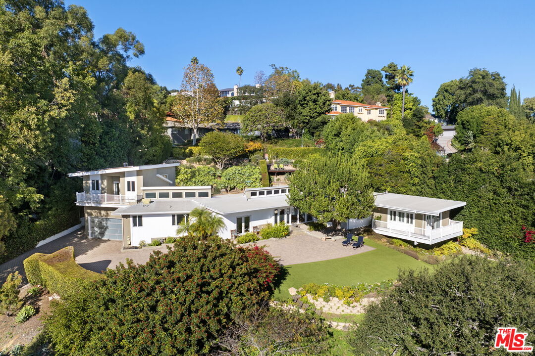 11215 Sunset Boulevard Los Angeles, CA 90049 - Photo 2 of 74 a aerial view of a house with a yard