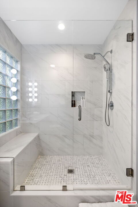 11215 Sunset Boulevard Los Angeles, CA 90049 - Photo 50 of 74 a bathroom with a shower