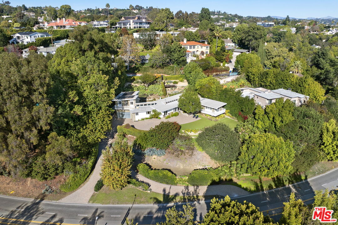 11215 Sunset Boulevard Los Angeles, CA 90049 - Photo 72 of 74 an aerial view of residential houses with outdoor space