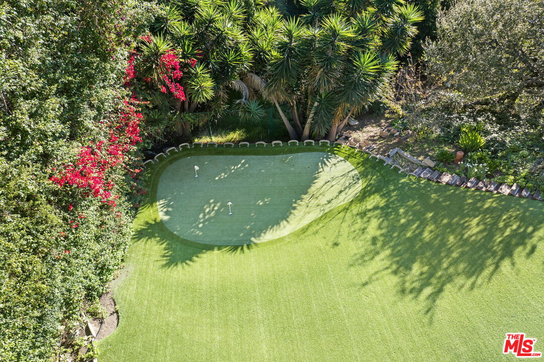 11215 Sunset Boulevard Los Angeles, CA 90049 - Photo 9 of 74 a view of a garden