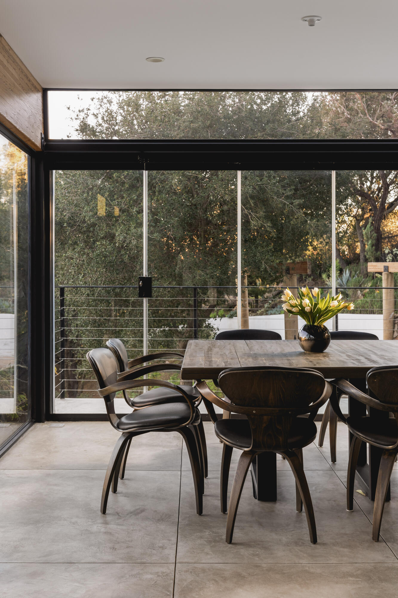 2315 Live Oak Meadows Road Malibu, CA 90265 - Photo 14 of 32 a view of a patio with a table and chairs