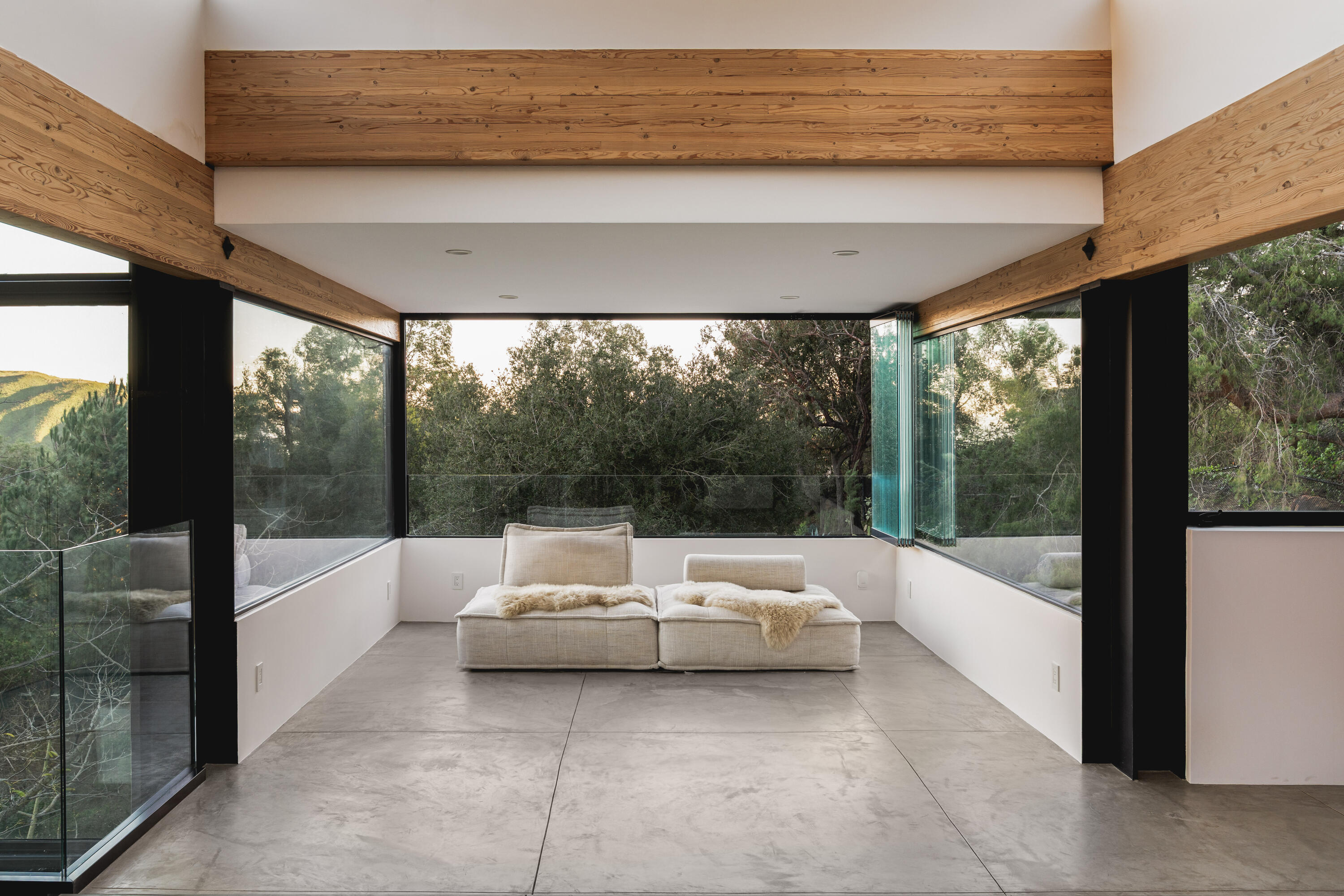 2315 Live Oak Meadows Road Malibu, CA 90265 - Photo 22 of 32 a balcony with furniture and outdoor view