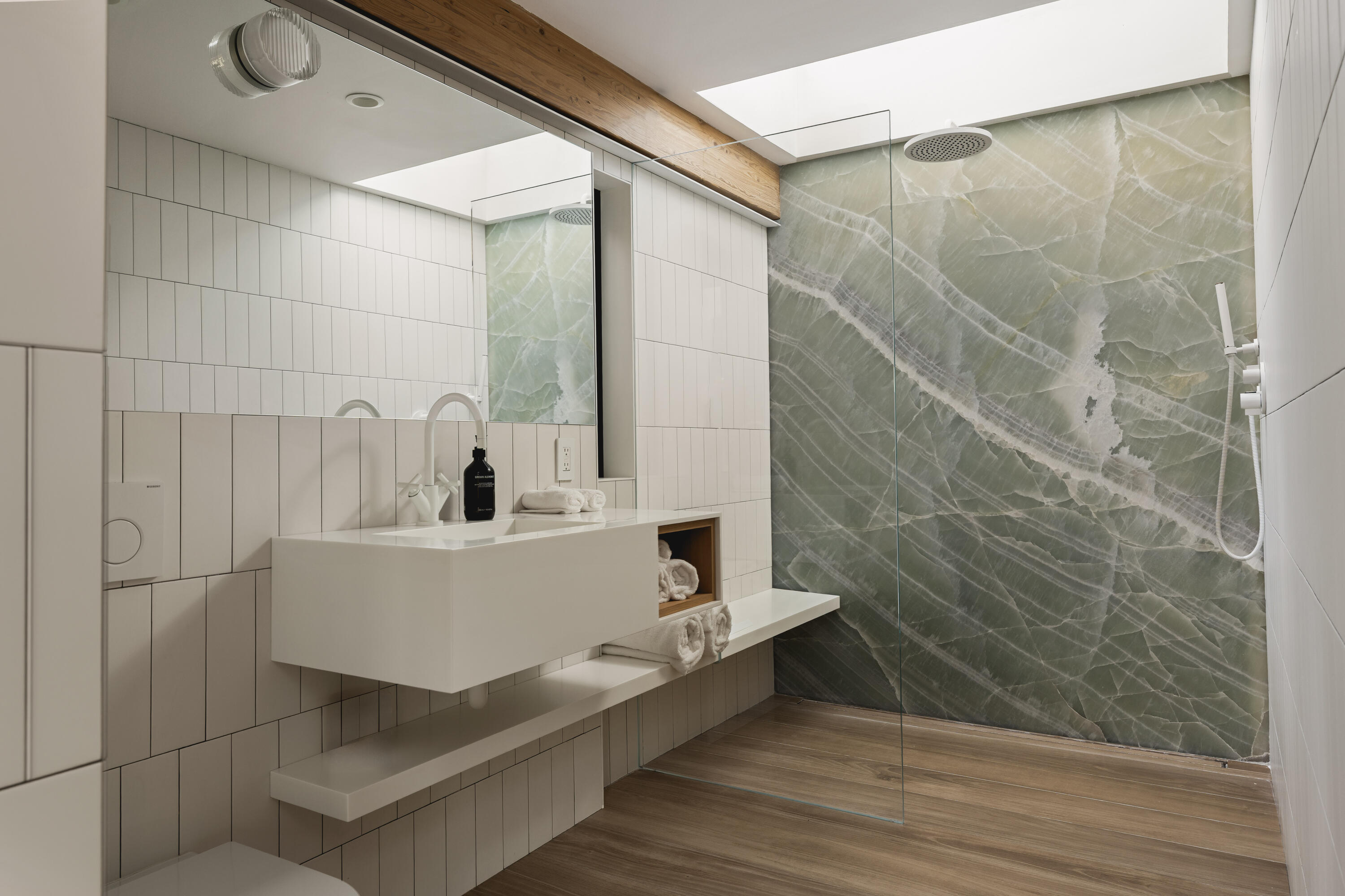2315 Live Oak Meadows Road Malibu, CA 90265 - Photo 24 of 32 a white bath tub sitting next to a white sink
