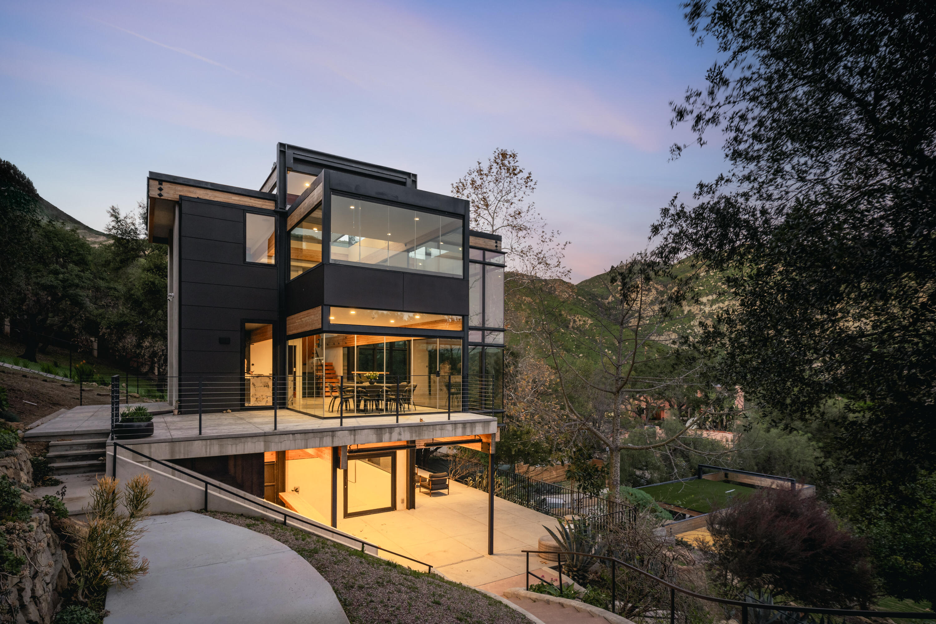 2315 Live Oak Meadows Road Malibu, CA 90265 - Photo 3 of 32 a view of a building with a tree