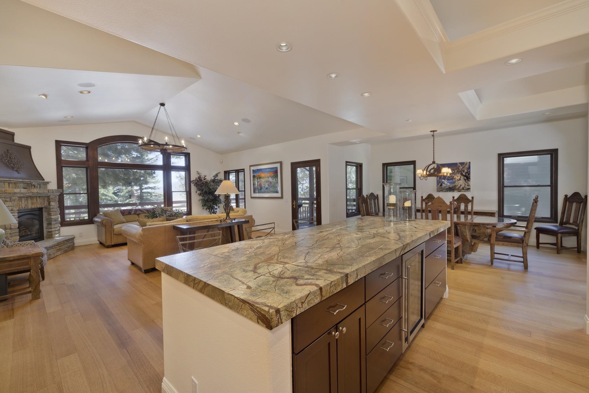 378 Ridge Way Mammoth Lakes, CA 93546 - Photo 12 of 43 Spacious open-concept interior featuring light wood-finish flooring