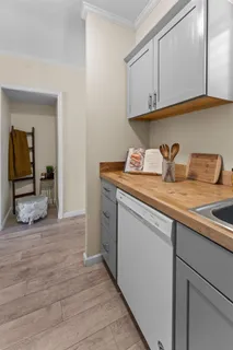 a view of cabinets with wooden floor