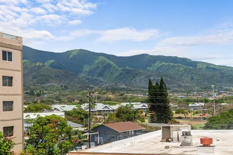 a view of a lake with a mountain in the background