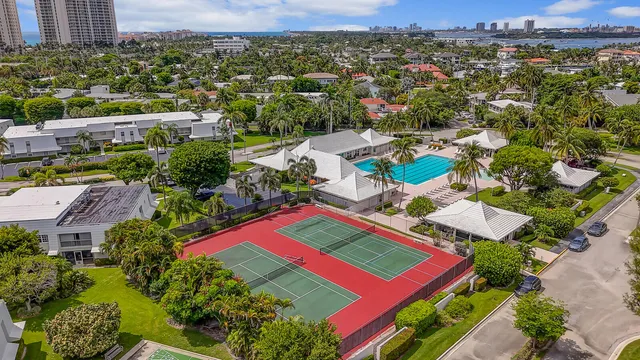 an aerial view of residential building with outdoor space and pool