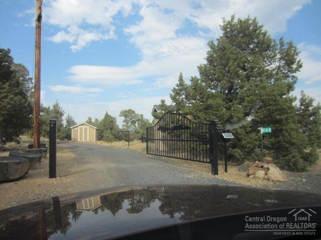 8188 Southwest Ridge Lane Powell Butte, OR 97753 - Photo 25 of 25 a view of a street with a building in the background