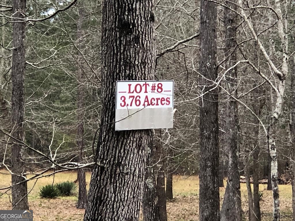 Lot 8 Spearhead Road Dublin, GA 31021 - Photo 1 of 1 a sign on the side of a building