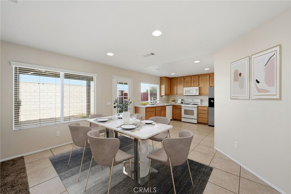 250 Settlers Road Upland, CA 91786 - Photo 11 of 31 a view of a dining room with furniture and window