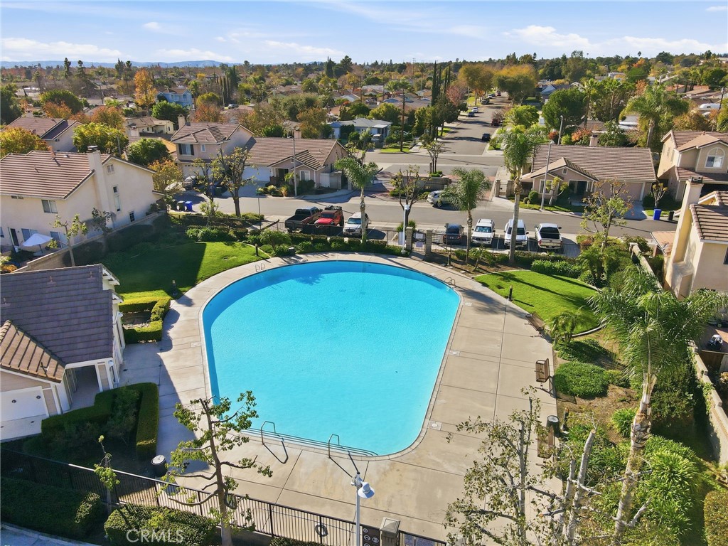 250 Settlers Road Upland, CA 91786 - Photo 4 of 31 an aerial view of a house with a swimming pool yard and mountain view in back