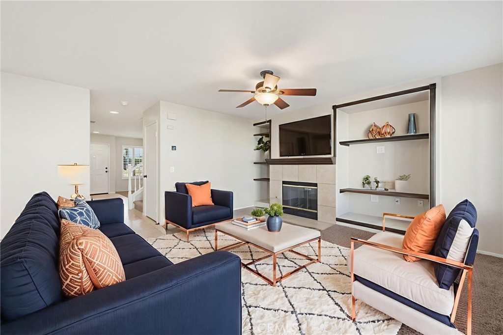 250 Settlers Road Upland, CA 91786 - Photo 10 of 31 a living room with furniture fireplace and flat screen tv