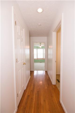 2153 Liebengood Road Goodlettsville, TN 37072 - Photo 11 of 20 The hallway leading to the secondary bedrooms has hardwood flooring....