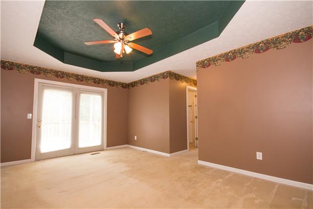 2153 Liebengood Road Goodlettsville, TN 37072 - Photo 8 of 20 The master bedroom has a walk-in-closet plus a full bath! There is also deck access that goes right out to the hot tub!