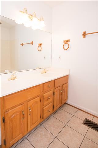 2153 Liebengood Road Goodlettsville, TN 37072 - Photo 10 of 20 It also has double vanities & tiled floor!