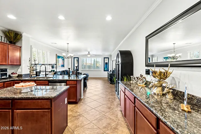 a kitchen with granite countertop a counter top space appliances and cabinets