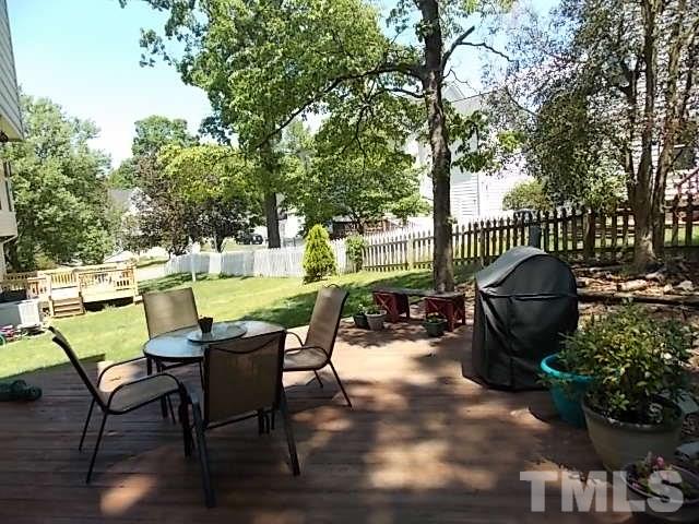 7316 Massachusetts Court Raleigh, NC 27615 - Photo 12 of 16 a view of a chairs and table in the patio