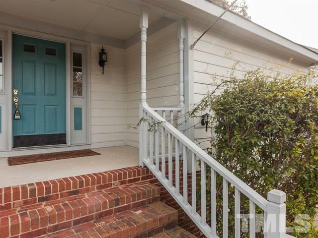7316 Massachusetts Court Raleigh, NC 27615 - Photo 2 of 16 a view of balcony with wooden floor and shower