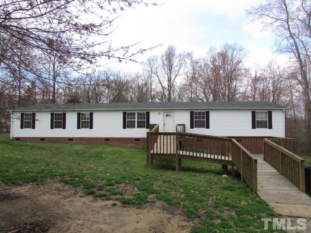 591 Allie Clay Road Roxboro, NC 27573 - Photo 1 of 16 a view of a house with a yard