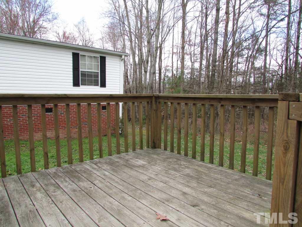 591 Allie Clay Road Roxboro, NC 27573 - Photo 14 of 16 a view of wooden deck