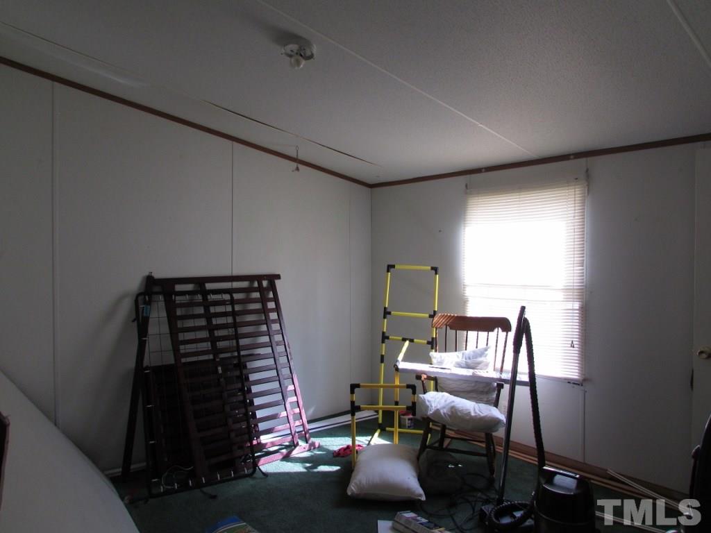 591 Allie Clay Road Roxboro, NC 27573 - Photo 10 of 16 a room with furniture
