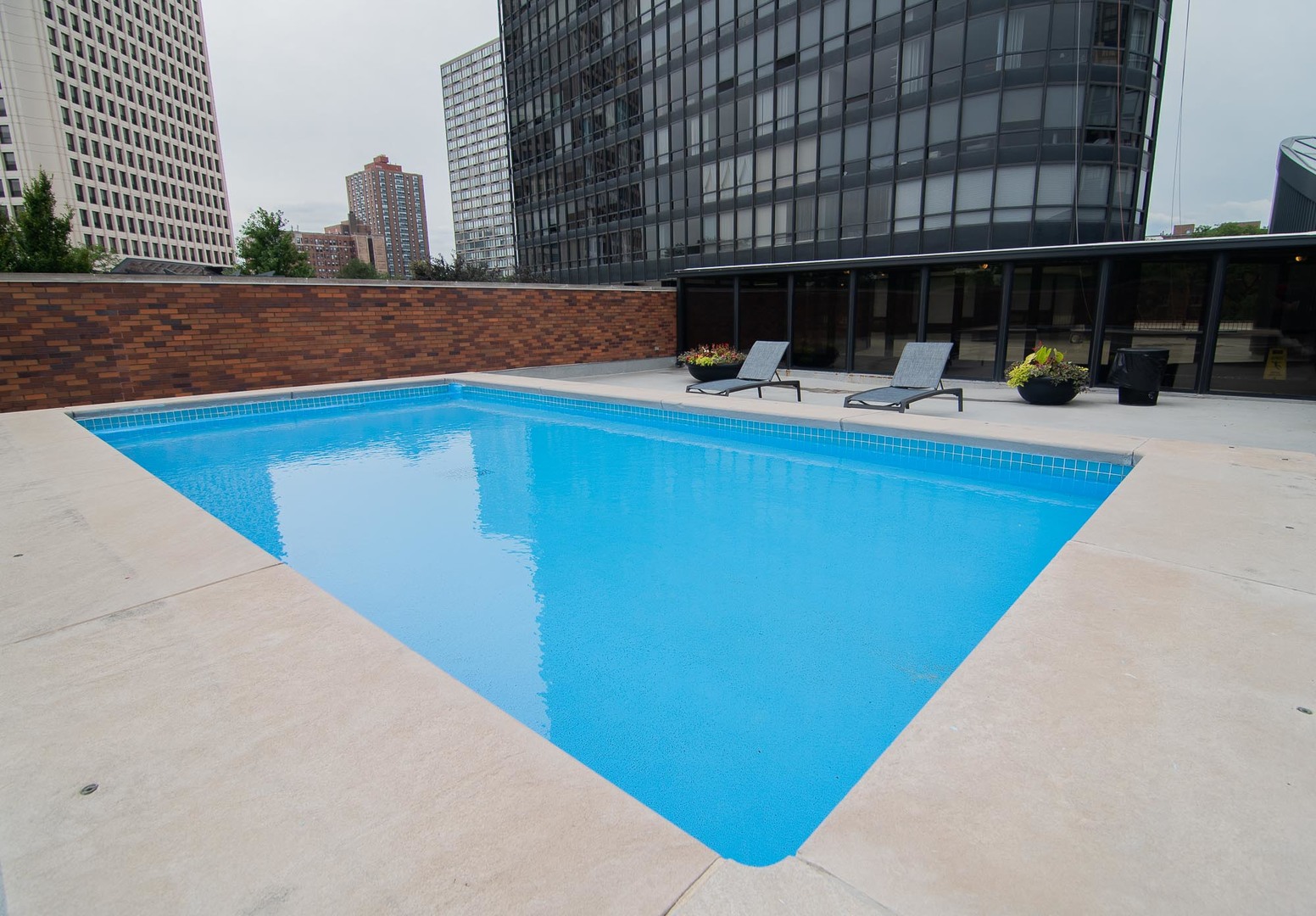 5415 North Sheridan Road, Unit 3808 Chicago, IL 60640 - Photo 15 of 16 a view of swimming pool with outdoor seating