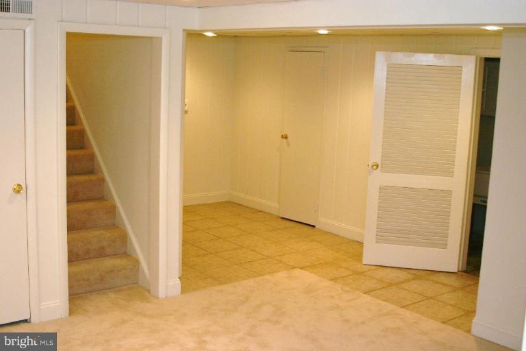 1110 Ednor Road Silver Spring, MD 20905 - Photo 8 of 30 an empty room with windows