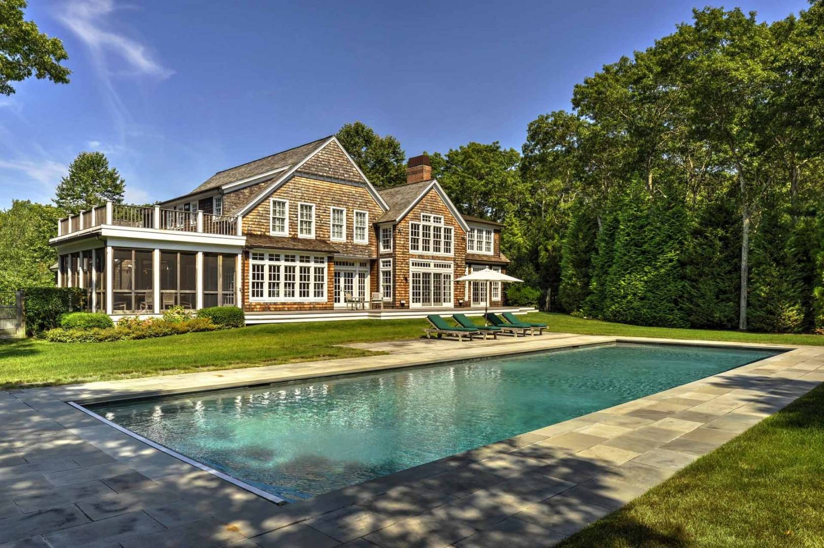 136 Merchants Path Wainscott, NY 11963 - Photo 1 of 17 a view of a house with a big yard