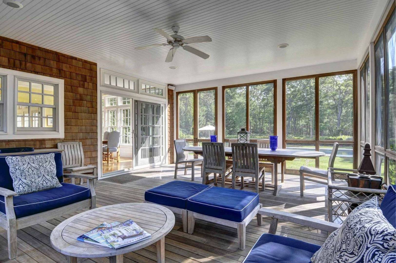 136 Merchants Path Wainscott, NY 11963 - Photo 7 of 17 a living room with furniture a table and a large window