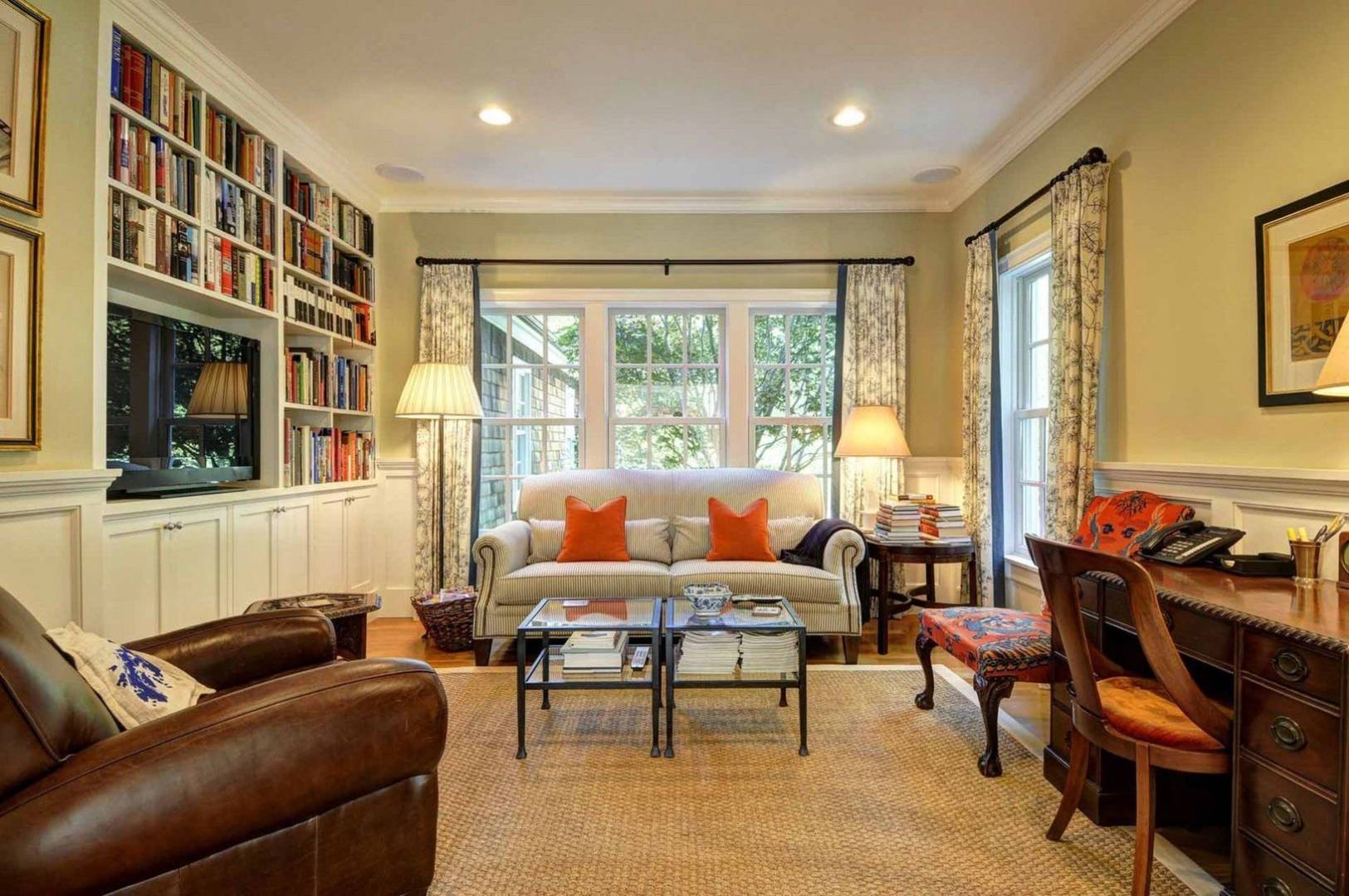 136 Merchants Path Wainscott, NY 11963 - Photo 8 of 17 a living room with furniture and a floor to ceiling window