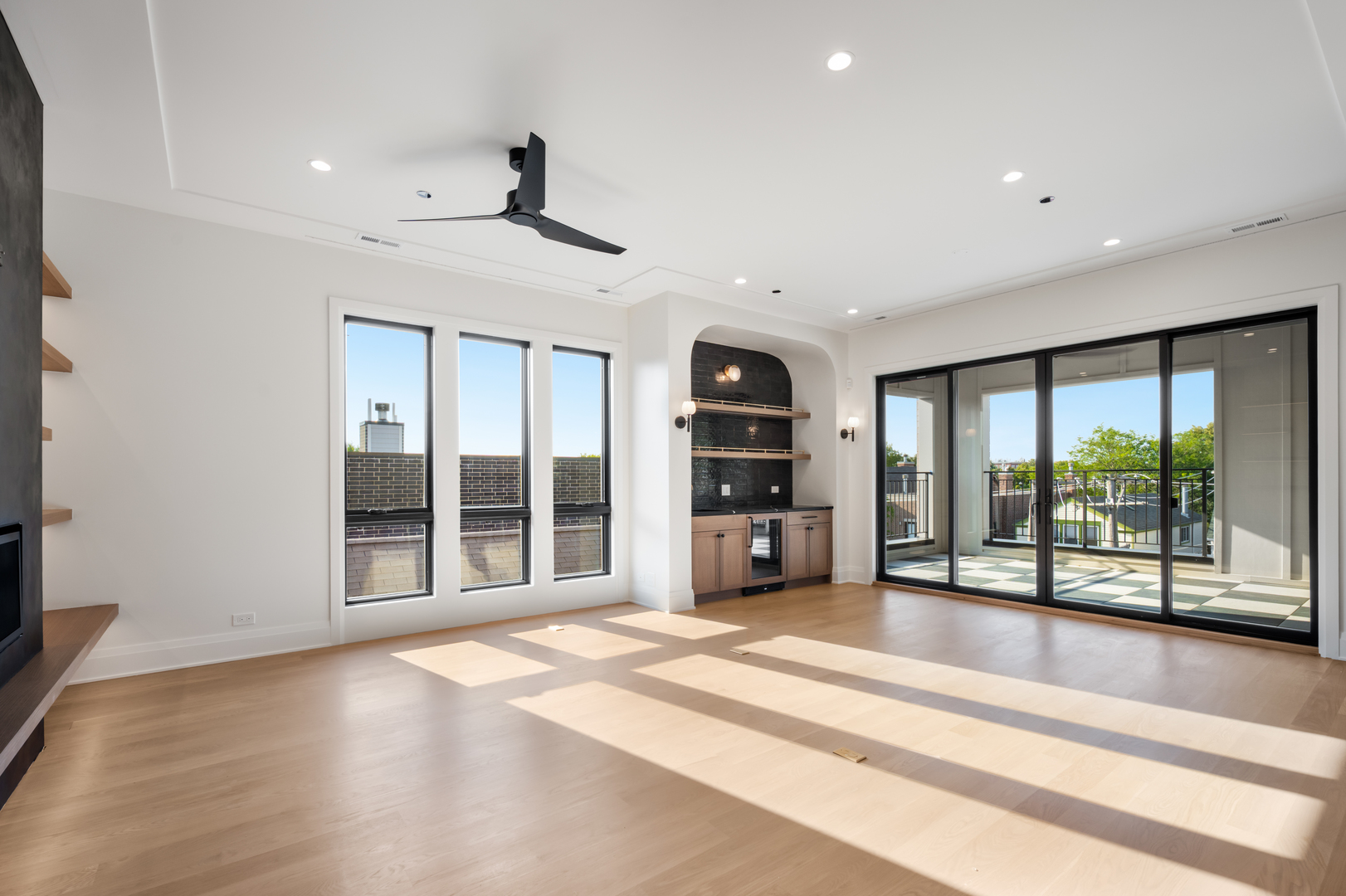 3923 North Janssen Avenue, Unit 2E Chicago, IL 60613 - Photo 10 of 13 a view of empty room with wooden floor and fan