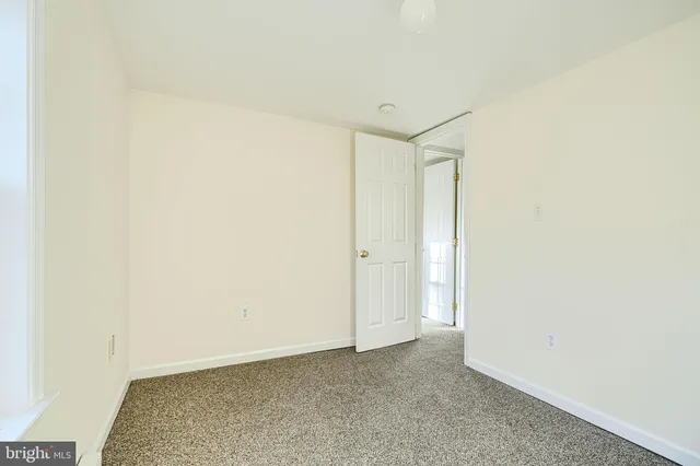 a view of a back yard of the house