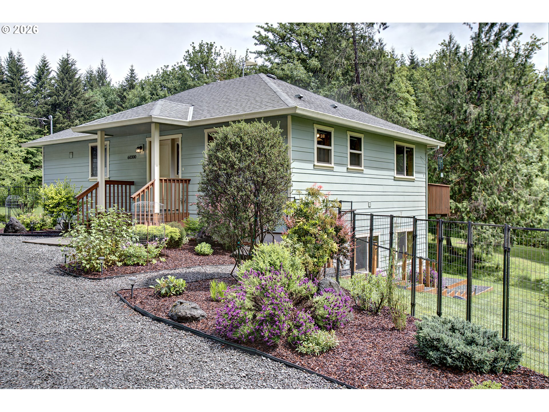60300 Rays Way St. Helens, OR 97051 - Photo 4 of 41 a front view of a house with a yard