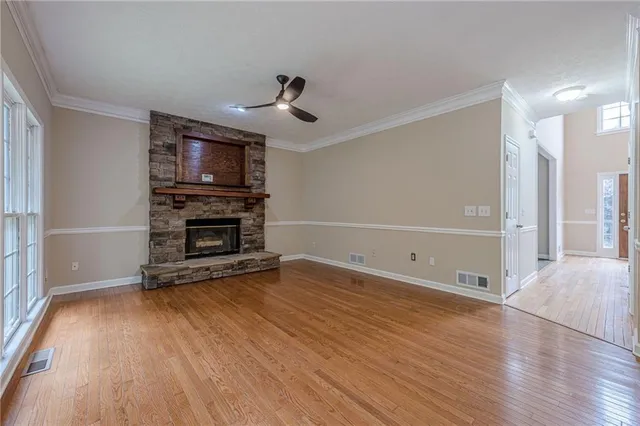 a kitchen with stainless steel appliances granite countertop a sink and cabinets