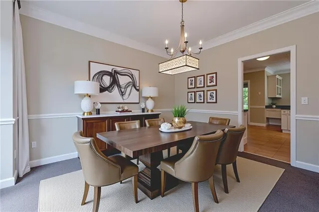 an empty room with a ceiling fan and a window