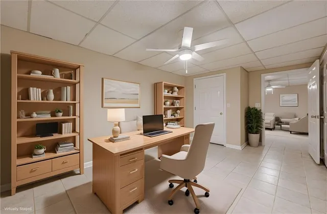 a view of a house with a yard and pathway