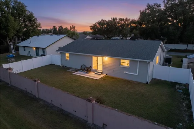 a view of a yard with an outdoor space