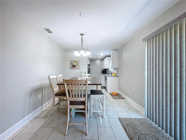 a kitchen with a stove and a microwave