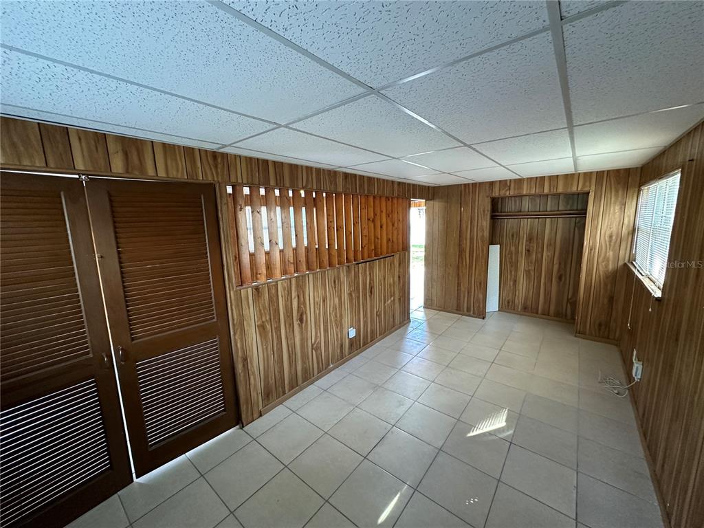 2002 20th Street West, Unit B Bradenton, FL 34205 - Photo 12 of 19 a view of empty room with wooden floor