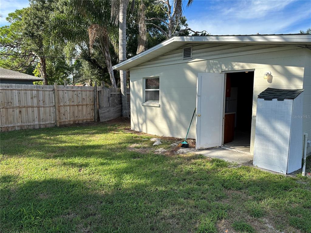 2002 20th Street West, Unit B Bradenton, FL 34205 - Photo 17 of 19 a front view of a house with garden