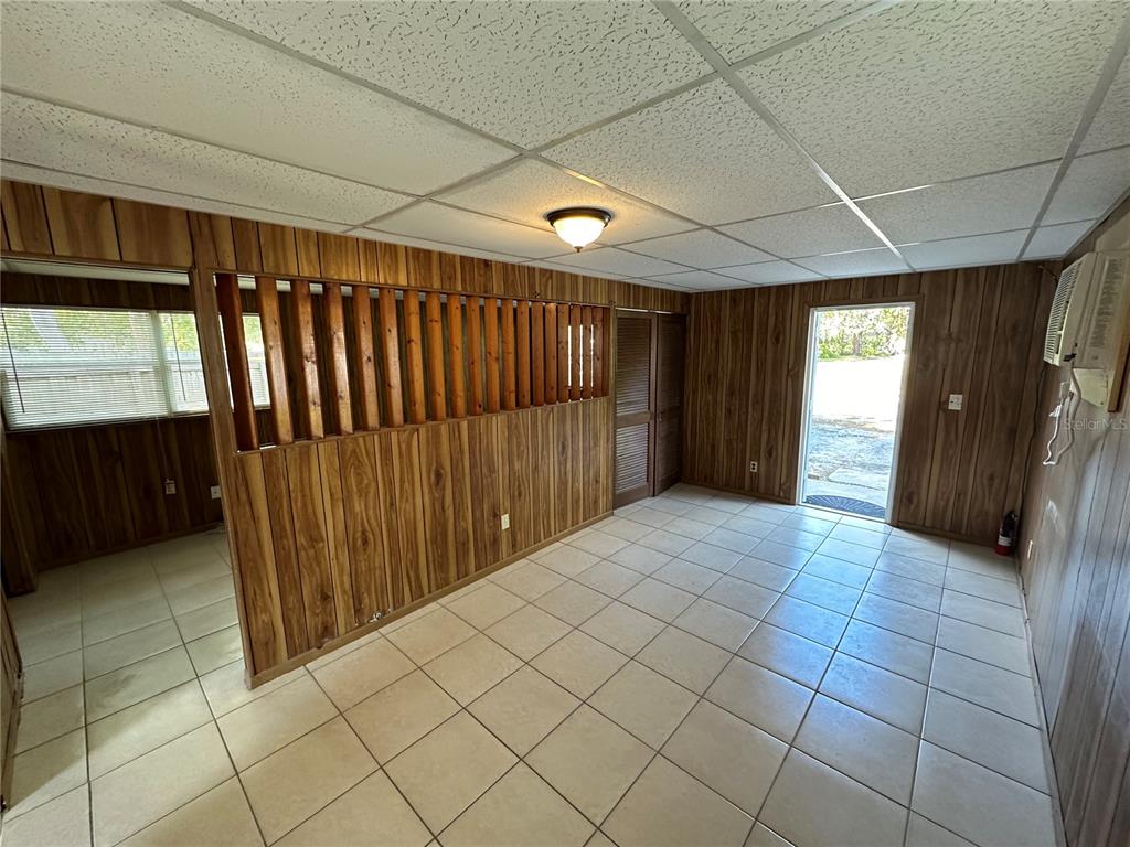 2002 20th Street West, Unit B Bradenton, FL 34205 - Photo 6 of 19 a view of entryway with wooden walls