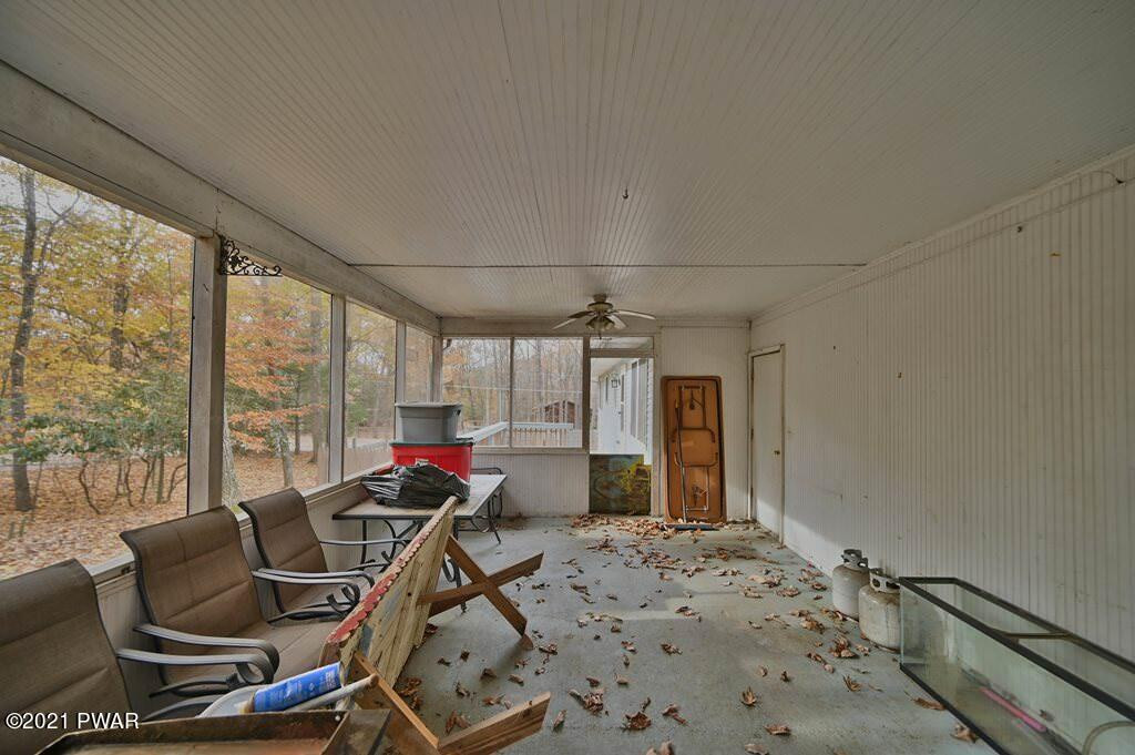 127 Estates Road Greentown, PA 18426 - Photo 85 of 85 a living room with furniture and a flat screen tv