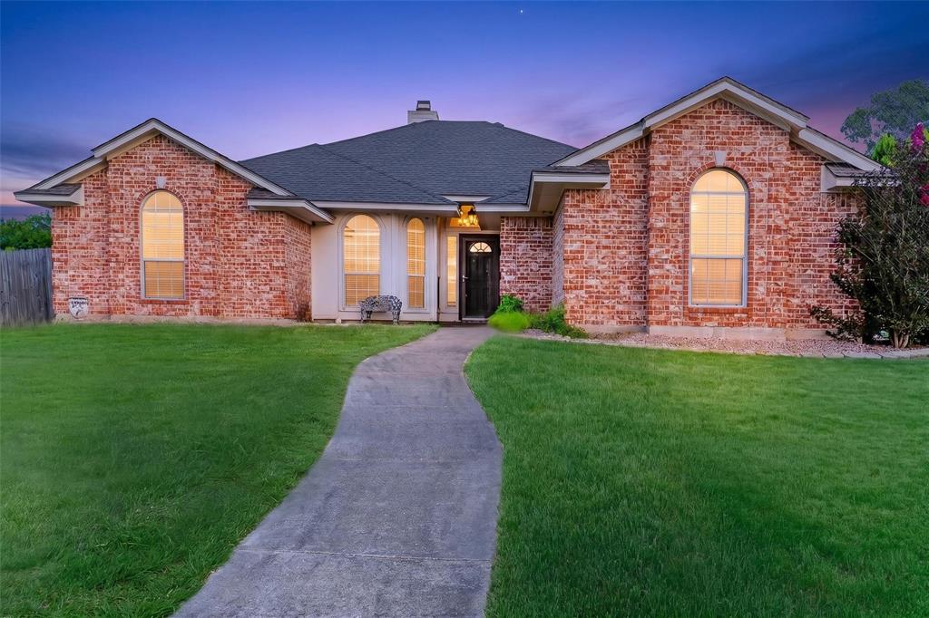 124 Topaz Circle Hewitt, TX 76643 - Photo 1 of 35 Brick exterior featuring a dark asphalt shingle roof