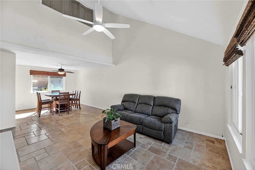 6116 East Paseo Rio Azul Anaheim, CA 92807 - Photo 12 of 54 a living room with furniture and a couch